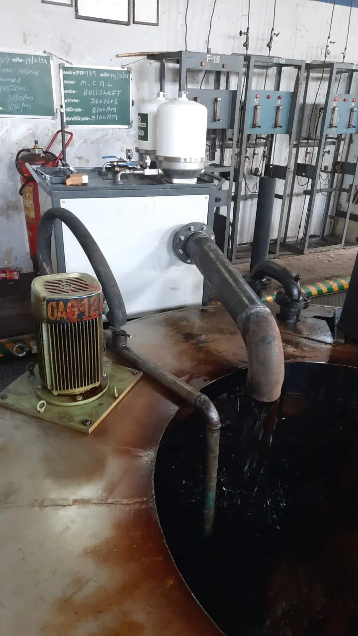 Centrifuge oil filtration unit installed on a quench oil tank returning filtered oil to the tank